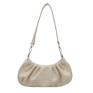 Elegant cream pleated croissant bag with silver metal buckles and sleek shoulder strap