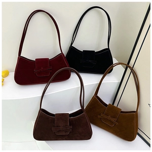 Collection of four vintage half-moon shoulder bags in burgundy, black, brown and camel