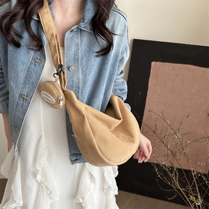 Retro corduroy dumpling bag in camel with matching mini coin purse and branded detail