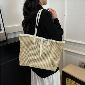 Large capacity woven straw tote bag with white leather straps for summer beach or commute