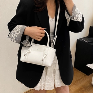 Borsa a mano trapezoidale bianca minimalista con scritta FASHION e nodo sul manico