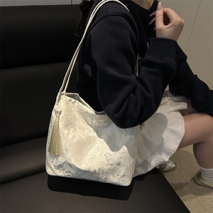 Elegant butterfly embroidery lace shoulder bag in beige with floral patterns and tassel