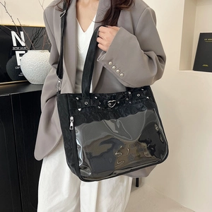 Minimalist black tote bag with transparent PVC window and heart-shaped metal clasp