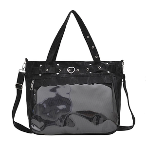 Minimalist black leather Ita bag with transparent heart buckle display window and studs