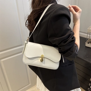 Minimalist white leather underarm bag with gold oval buckle for urban women
