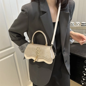 Champagne sequin crossbody bag with metal tassel and double S logo for women