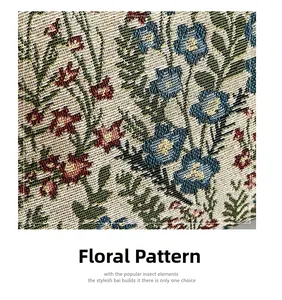 Detailed close-up of the elegant floral jacquard texture on this stylish crossbody bag