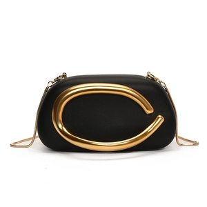 Elegant black pebble leather handbag with gold C-shaped buckle and metal chain strap