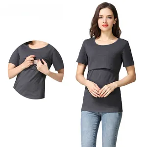 Detail view of hidden horizontal nursing opening on dark grey cotton maternity t-shirt