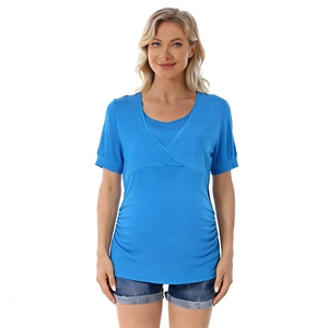 Detail of royal blue maternity top featuring a V-neck cross design and side ruching details