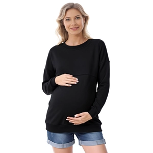 Detail of black maternity sweatshirt with hidden nursing function and soft fleece lining