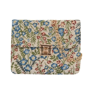 Floral jacquard shoulder bag with blue and red patterns and golden chain strap