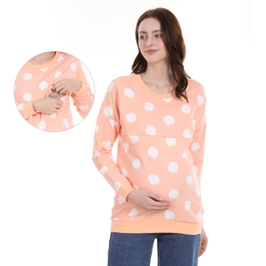 Polka dot maternity breastfeeding hoodie with hidden nursing zipper in warm peach pink