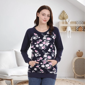 Detail of floral maternity hoodie featuring ribbed cuffs and functional kangaroo pocket