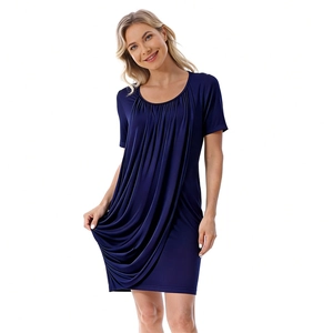 Detail of soft modal maternity dress featuring front pleats and round neckline