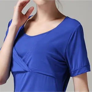 Detail of the blue nursing top showing the layered V-neck crossover and soft modal fabric