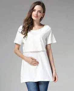 Detail of white cotton nursing T-shirt with double-layer opening for breastfeeding