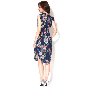 Rear view of navy blue floral maternity dress with side slit and waist tie detail