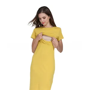 Détail d'une robe de maternité jaune avec ouverture d'allaitement discrète pour les mamans
