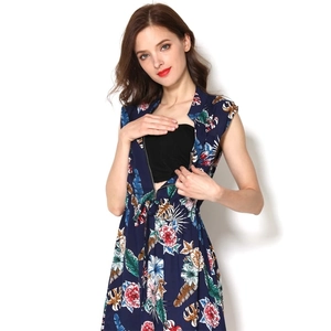 Floral maternity nursing dress in navy blue with concealed zipper and adjustable waist