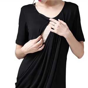 Detail of the soft modal nursing dress with double-layer crossover design for easy breastfeeding