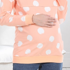 Close-up of cotton nursing sweatshirt with hidden zipper for breastfeeding and polka dots