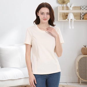 Detailed fit of a short-sleeved cotton maternity nursing T-shirt in soft cream color