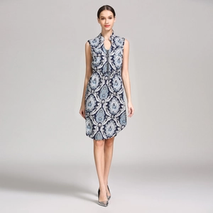 Detail of floral maternity dress showing zipper neckline and adjustable drawstring waist