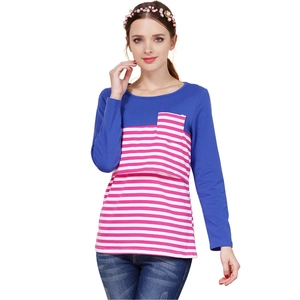 Detail of breastfeeding nursing top showing functional opening and pink striped pocket