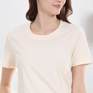 Detail of soft cream nursing T-shirt neckline and high-elastic cotton fabric texture