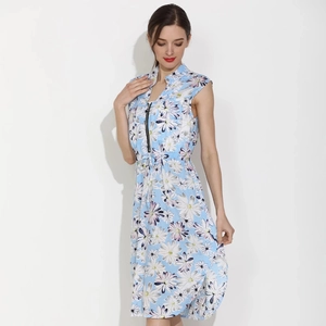 Close-up of maternity dress featuring floral daisy print with front zipper and drawstring waist
