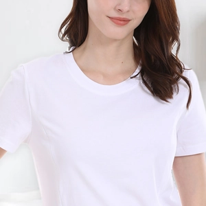 Close-up of soft white cotton nursing T-shirt showing round neck and smooth texture