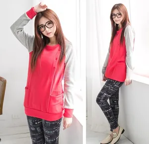 Detail of red and grey patchwork maternity hoodie with side buttons and lettered leggings