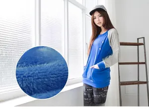 Detail view of royal blue nursing hoodie featuring soft fleece lining and side buttons