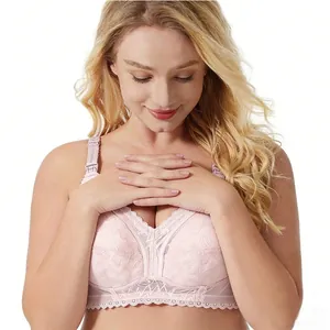 Close-up of light pink lace nursing bra with breathable mesh and wide straps