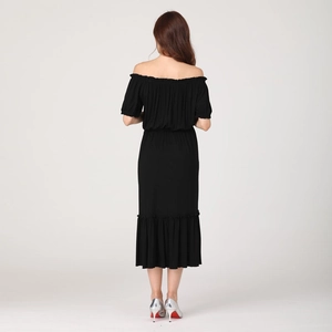 Elegant black off-the-shoulder maternity maxi dress with ruffled hem and empire waist design
