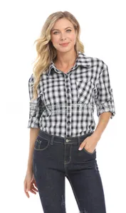 Detail of navy blue plaid nursing shirt featuring adjustable roll-up sleeves and V-neck
