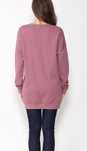 Back view of a dusty pink oversized maternity sweatshirt with ribbed cuffs and hem