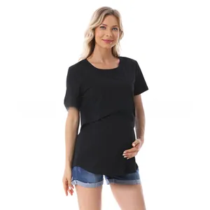 Detail of black maternity nursing t-shirt with functional layered design for easy breastfeeding