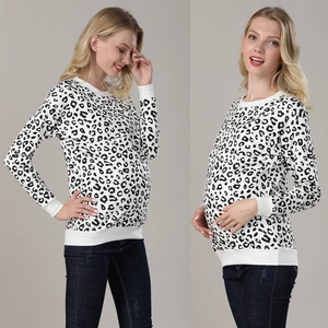 Detail view of Leopard print maternity nursing sweatshirt with ribbed cuffs and hem