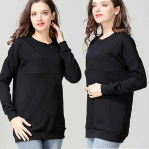 Detail view of black nursing sweatshirt showing hidden breastfeeding zippers and ribbed cuffs