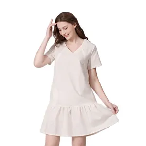 Short sleeve V-neck maternity dress in off-white cotton linen with tiered ruffle hem