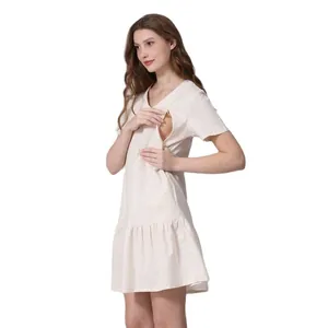 Detail of side invisible zipper nursing access on cream V-neck maternity dress