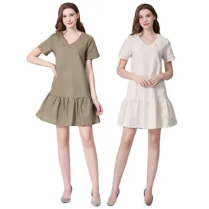 Detail of V-neck short sleeve nursing dress with ruffle hem in olive green and beige linen