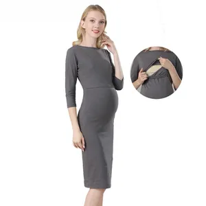 Detail view of the nursing opening on this slim-fit dark gray striped maternity dress