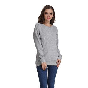Detail of light grey cotton maternity sweatshirt showing ribbed cuffs and soft fabric texture
