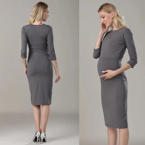 Front and back view of a slim-fit grey long-sleeve maternity dress with elastic fabric