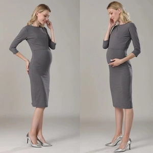 Side view of dark gray fitted long-sleeve maternity dress in stretchy knit fabric