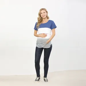Detail of color-block maternity nursing T-shirt with navy top and striped bottom hem
