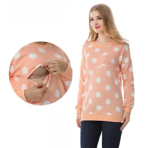 Detail of invisible zipper opening on a polka dot cotton maternity and nursing sweatshirt